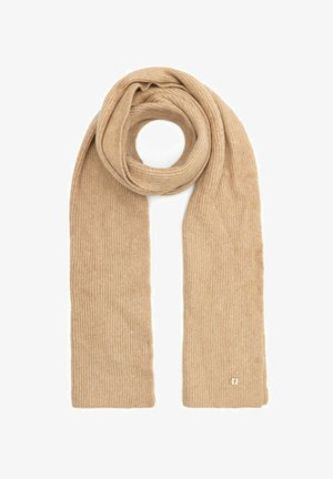 Beżowy szalik z wypustkami, wykonany z miękkiego materiału, z ciągłym pętlowym wzorem i małym akcentem logo blisko końca.