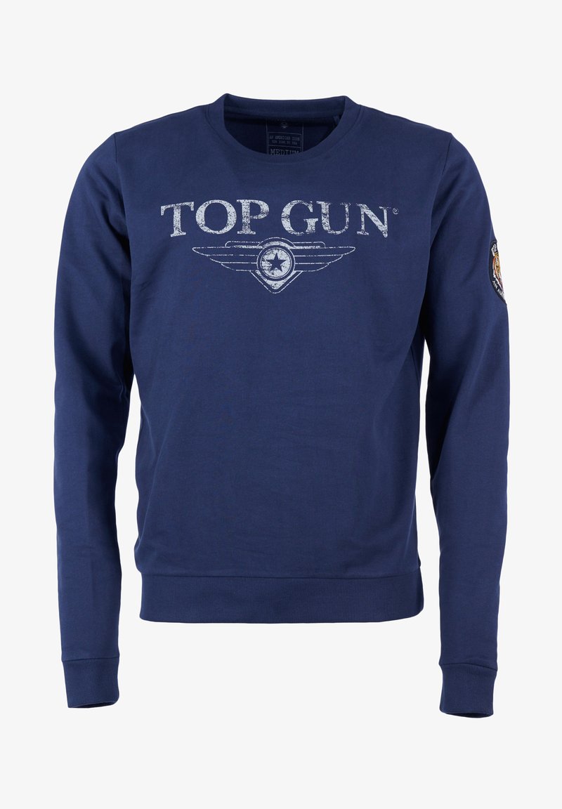 Marinblå sweatshirt med långa ärmar, ribbade muddar och rundad halsringning. Har en blek vit "TOP GUN"-logotyp och vingar grafik på framsidan.