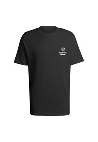 Black cotton t-shirt featuring a crew neckline, short sleeves, and a white printed logo that reads "superstar PARIS." Soft texture.