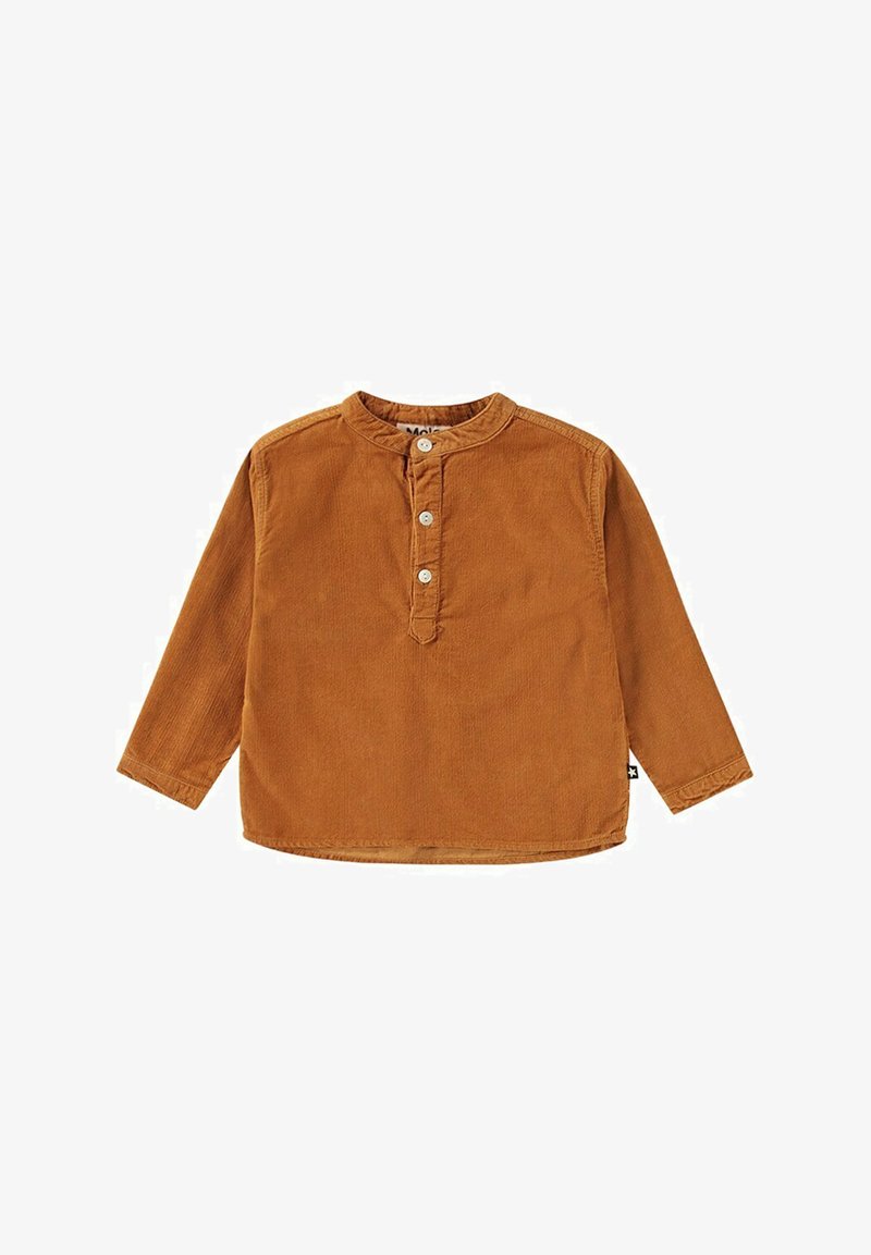 Brun kordflod långärmad skjorta med rund mandarinkrage, tre framknappar och rak fåll. Mjuk textur med subtila ribbor.