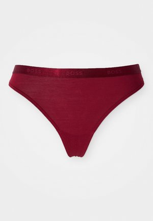 Burgundy thong with a smooth texture, featuring a satin waistband embossed with "BOSS" in matching color. Simple, sleek design.