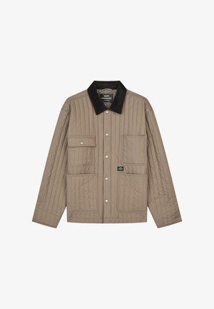 Beige tikattu takki mustalla kauluksella, nepparikiinnitys ja neljä etutaskua, joista yhdessä on läppä ja nappikoriste.