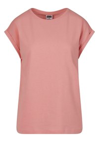 Rosa t-skjorte med korte ermer laget av myk bomull. Har en rund halslinning og en avslappet passform med rullede ermer. Rent, enkelt design.