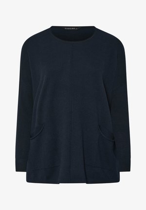 Jersey de punto oversized azul marino con mangas largas, escote redondo y dos bolsillos frontales. Acentos de puños y dobladillo acanalados.