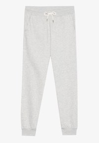 Pantaloni de trening gri, dintr-un material moale, având un tiv elastic cu șnur, buzunare laterale și manșete ribbate la glezne.