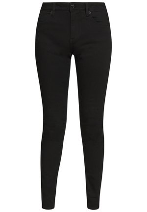 Crne uske traperice od rastezljive mješavine pamuka. Sadrži pet džepova, petlje za remen i zatvaranje na patentni zatvarač. Glatka tekstura, klasični dizajn.