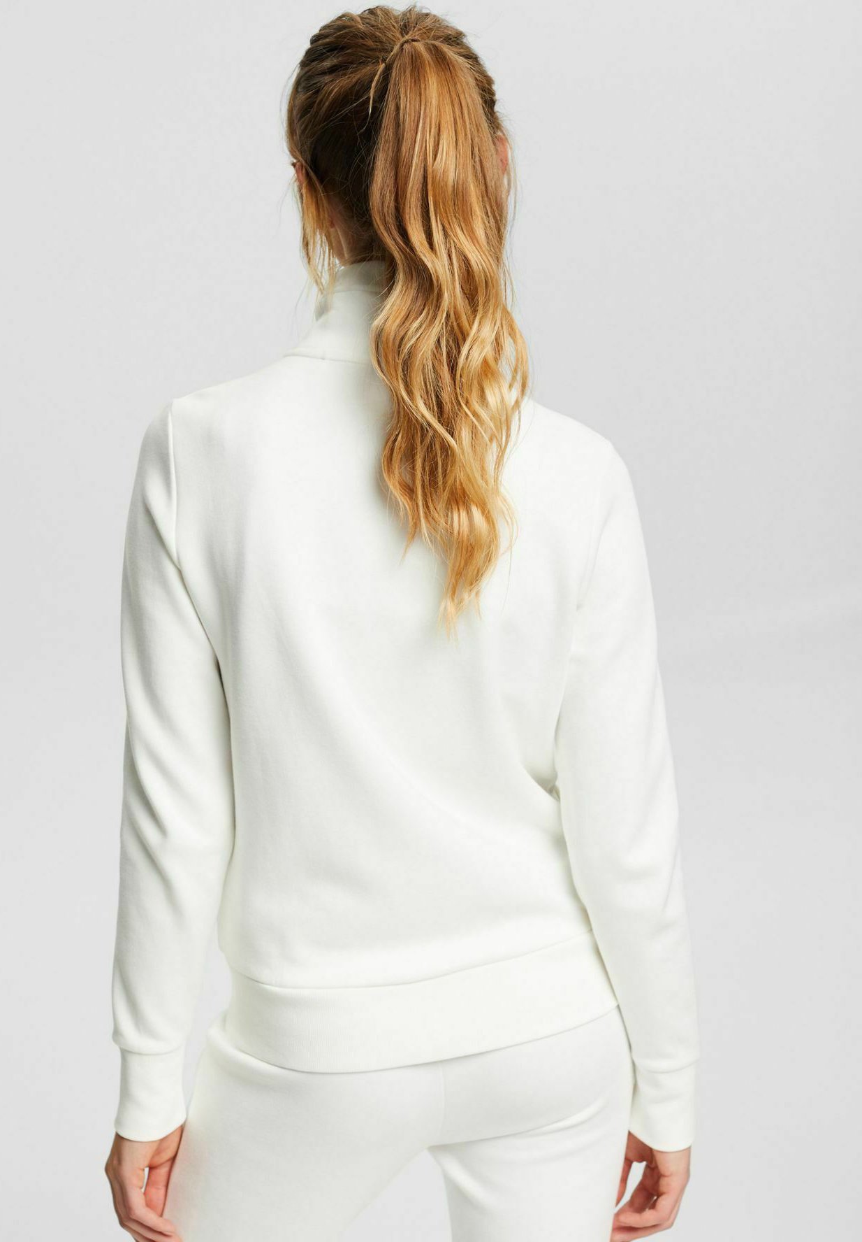 white sports sweater