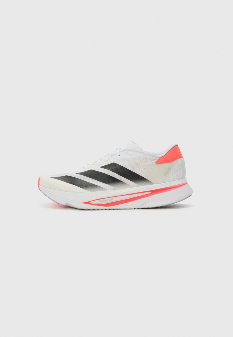 White running shoe with black stripes, curved design, lightweight mesh upper, prominent heel tab in bright red, and a thick sole with pink accents.