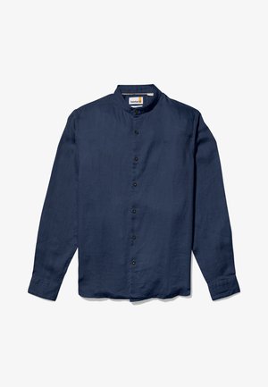 Marineblå langærmet skjorte med en mandarinkrave, frontknaplukning og diskret tekstur. Har et lille logo på brystet.