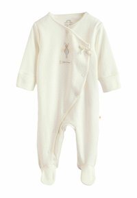 Baby-Strampler in Cremefarbe mit langen Ärmeln, Punktmuster, Wickeldesign, dekorativer Schleife und gedrucktem Hasenmotiv. Druckknöpfe für einfaches An- und Ausziehen.