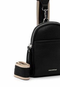 Black textured leather crossbody bag with silver zippers and a detachable black and beige woven strap, branded EMILY & NOAH.
