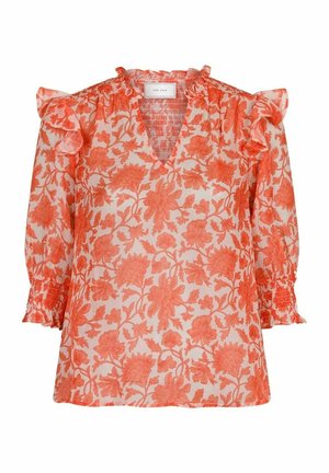 Hvid bluse med orange blomsterprint, flæsekant ved skuldrene, trekvart puffede ærmer og smockede manchetter.