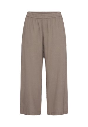 Väljästi istuvat, lyhennetyt housut vaaleanruskeina, joissa on joustava vyötärönauha, eikä näkyviä taskuja tai koristeita.