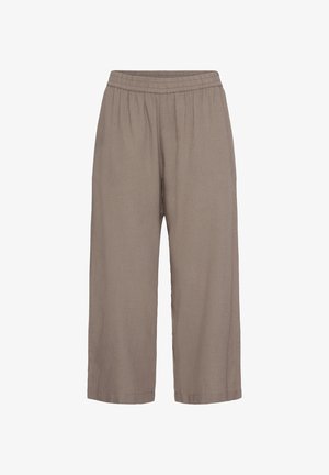 Väljästi istuvat, lyhennetyt housut vaaleanruskeina, joissa on joustava vyötärönauha, eikä näkyviä taskuja tai koristeita.