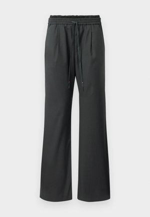 Pantalons larges noirs avec une taille élastique et de longues cordons, présentés sur un fond blanc uni.