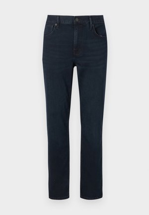 Jeans de mezclilla azul oscuro con un diseño de pierna recta, que cuentan con una cremallera, bolsillos frontales y un ligero desgaste en los muslos.