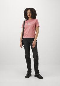 Calvin Klein Jeans COMBAT SLING MULE - Jalga libistatavad jalanõud - triple black