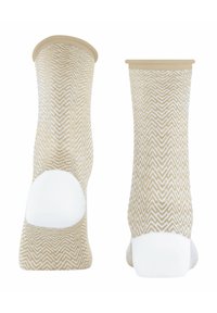 Beige Socken mit einem Fischgrätmuster und weißen Akzenten an Ferse und Zehen. Weicher Stoff, mittellange Knöchellänge und elastischer Bund für Komfort.