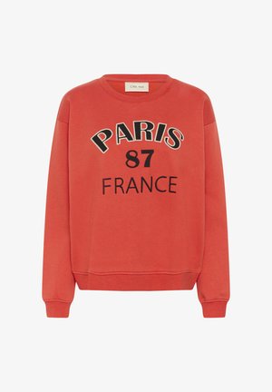 Felpa rossa con maniche lunghe, polsini a coste e la scritta "PARIS 87 FRANCE" stampata in nero sul davanti.