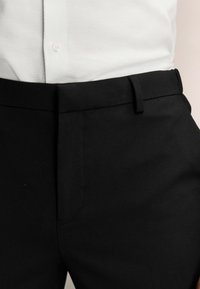 Next ATHLETIC FIT MOTIONFLEX STRETCH - SLIM FIT - Öltönynadrág - black
