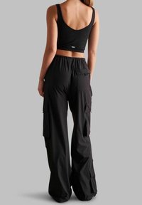 aim’n® Cargobyxor - black