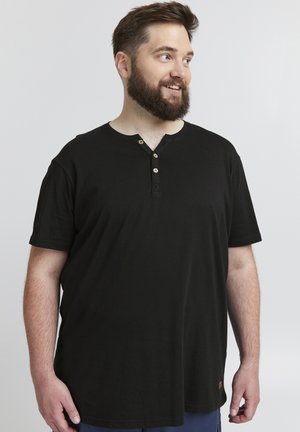 Black short-sleeve T-shirt made of soft cotton, featuring a crew neck and three-button closure at the collar. Minimalist design with no patterns.