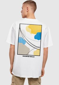 Merchcode UNLIMITED SKILLS  - T-shirts print - white