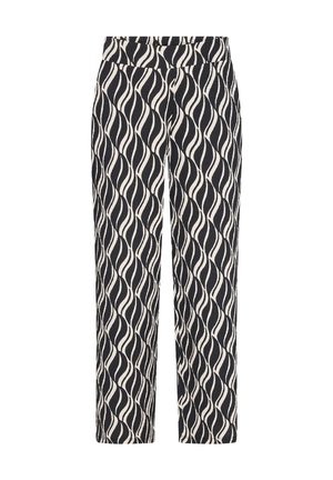 Pantalon noir et blanc taille haute avec un motif abstrait ondulé et une coupe droite.