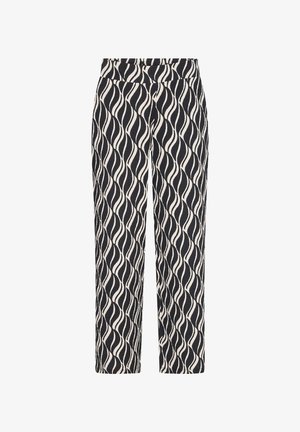 Pantalon noir et blanc taille haute avec un motif abstrait ondulé et une coupe droite.