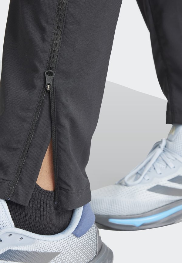 OWN THE RUN 3-STRIPES - Tracksuit bottoms3