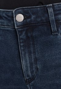 Wrangler Jeans Skinny Fit - dark-blue denim