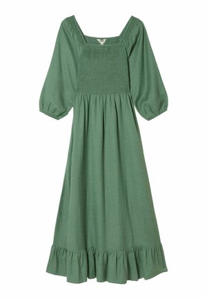 Green cotton dress with a square neckline, smocked bodice, puff sleeves, and a ruffled hem. The fabric has a textured weave.