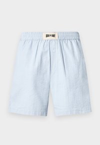 Hellblaue Baumwollshorts mit einem strukturierten Rippmuster, ausgestattet mit einem elastischen Bund und einem am Rücken angenähten Logo-Tag.