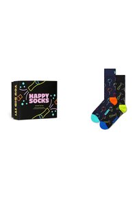 Colorful gift box with "HAPPY SOCKS" branding. Two pairs of black socks with vibrant patterns, including balloons and party poppers, contrasting cuffs.