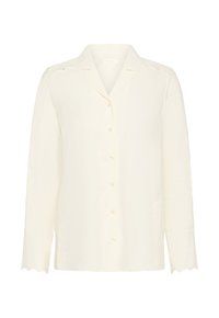 Krēmkrāsas garām piedurknēm blūze ar pogām priekšpusē, ar izgriezumu apkakli un vilinošu mežģīņu apdari uz aprocēm un pleciem.