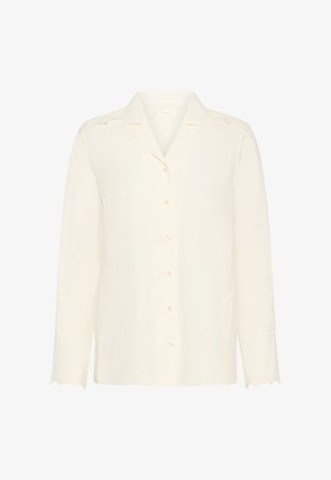Cremefarvet bluse med lange ærmer, knapper foran, notch-krave og bølget blonderkant på manchetter og skuldre.