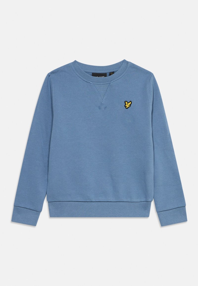Sweat-shirt bleu à manches longues avec col rond, petit logo d’oiseau jaune sur la poitrine gauche, avec poignets et ourlet côtelés.