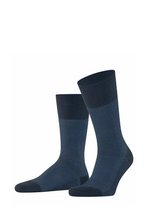 Calzini blu navy con motivo a spina di pesce, polsini a coste e rinforzi sul tallone e sulla punta per una maggiore durabilità.