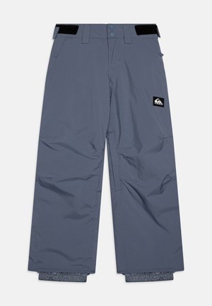 Graue wasserdichte Schneehosen mit lockerer Passform, elastischen Bündchen, Gürtelschlaufen und einem Logo-Patch auf der vorderen linken Tasche.