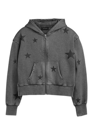 Sweat à capuche zippé gris avec poches avant, poignets côtelés et motifs d'étoiles noires dispersés sur les manches et l'avant.