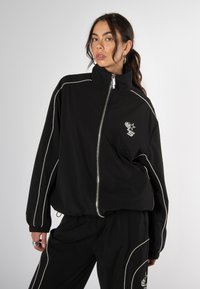 Love Scars COACH TRACK UNISEX - Treniņjaka - midnight purple