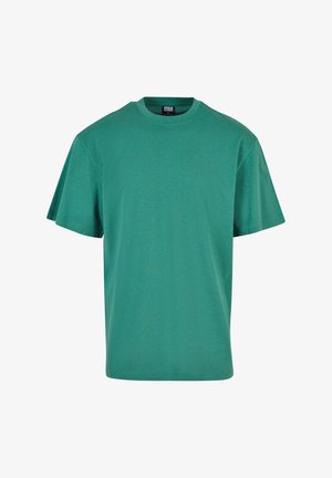 Green short-sleeve t-shirt made of cotton, featuring a crew neck, relaxed fit, and smooth texture. No patterns or accents.