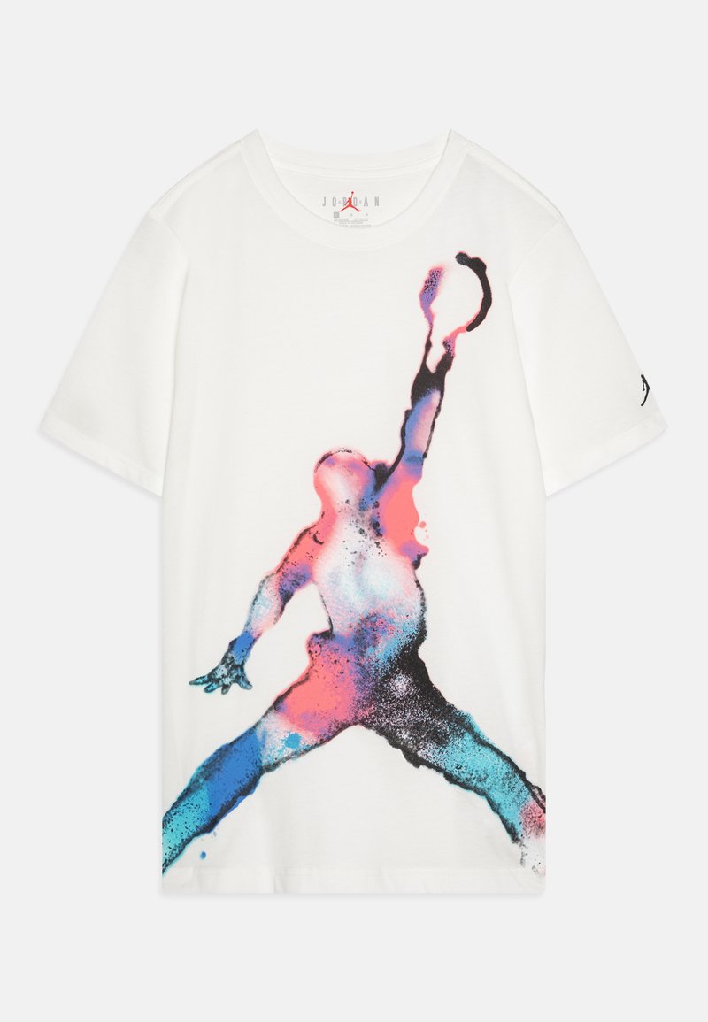 White cotton t-shirt featuring a large graphic of a jumping figure in blue and pink splatter patterns, with a black logo on the sleeve.