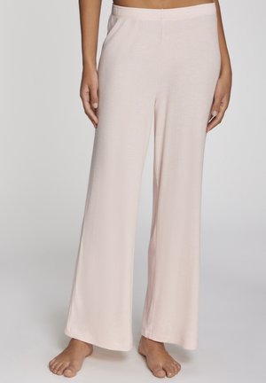Helle rosa Lounge-Hosen aus geripptem Stoff mit weitem Bein Schnitt und elastischem Bund, die eine weiche Textur und einen nahtlosen Abschluss aufweisen.