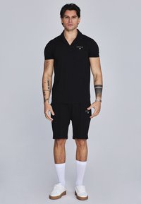 SET - Pantaloni sportivi - black