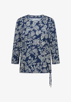 Top a maniche lunghe blu navy con motivo floreale bianco, scollo rotondo e dettaglio con fiocco laterale all'orlo.