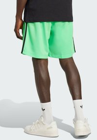 adidas Originals FIREBIRD - Tracksuit bottoms - screaming green   black