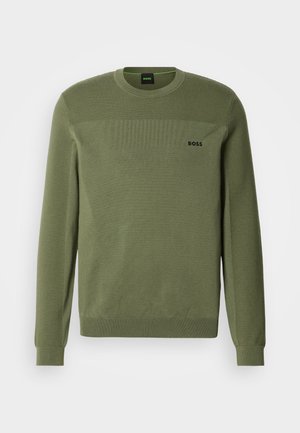 Olive green sweater with a crew neckline, textured knit pattern, ribbed cuffs, and hem. Features a subtle logo on the chest.