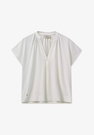 Balta trumpa rankovėmis palaidinė su V formos iškirpte, priekiniais raukiniais ir mažo logotipo detale apatinėje siūlėje. Minkšta medžiaga, laisva forma.