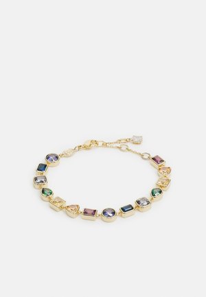 Gold-tone bracelet featuring various cut gemstones in colors including green, blue, purple, and clear, set in rectangular and round settings.